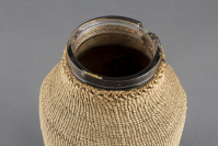 Klamath%20artist%3B%20Modoc%20artist%2C%20%3Cb%3E%3Ci%3E%20Basketry%20Covered%20Milk%20Bottle%3C%2Fi%3E%3C%2Fb%3E%2C%20ca.%201920%2C%20cattail%2C%20tule%2C%20glass%2C%20and%20natural%20dyes%2C%20The%20Elizabeth%20Cole%20Butler%20Collection%2C%20no%20known%20copyright%20restrictions%2C%202012.126.62